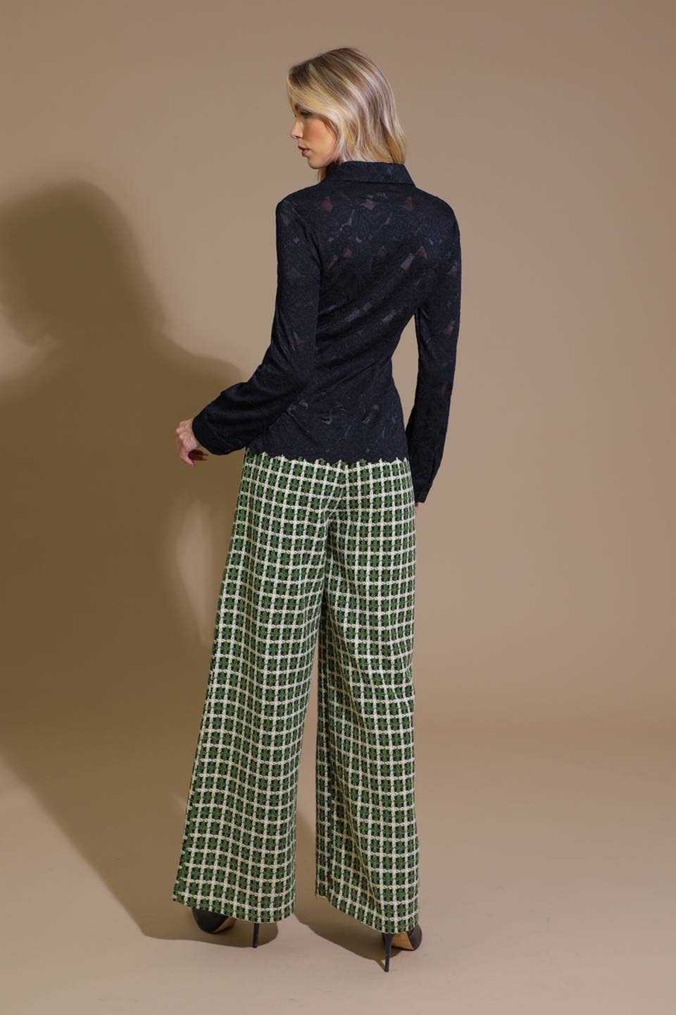 A lace top featuring shirt