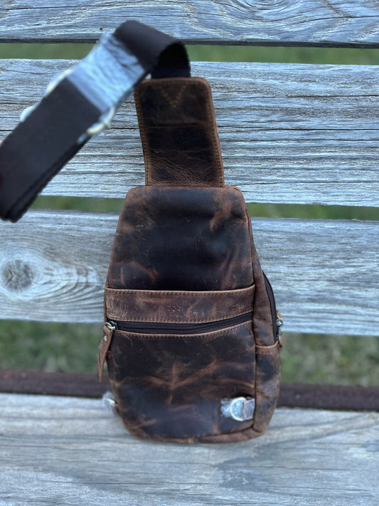 Antiqued leather sling bag