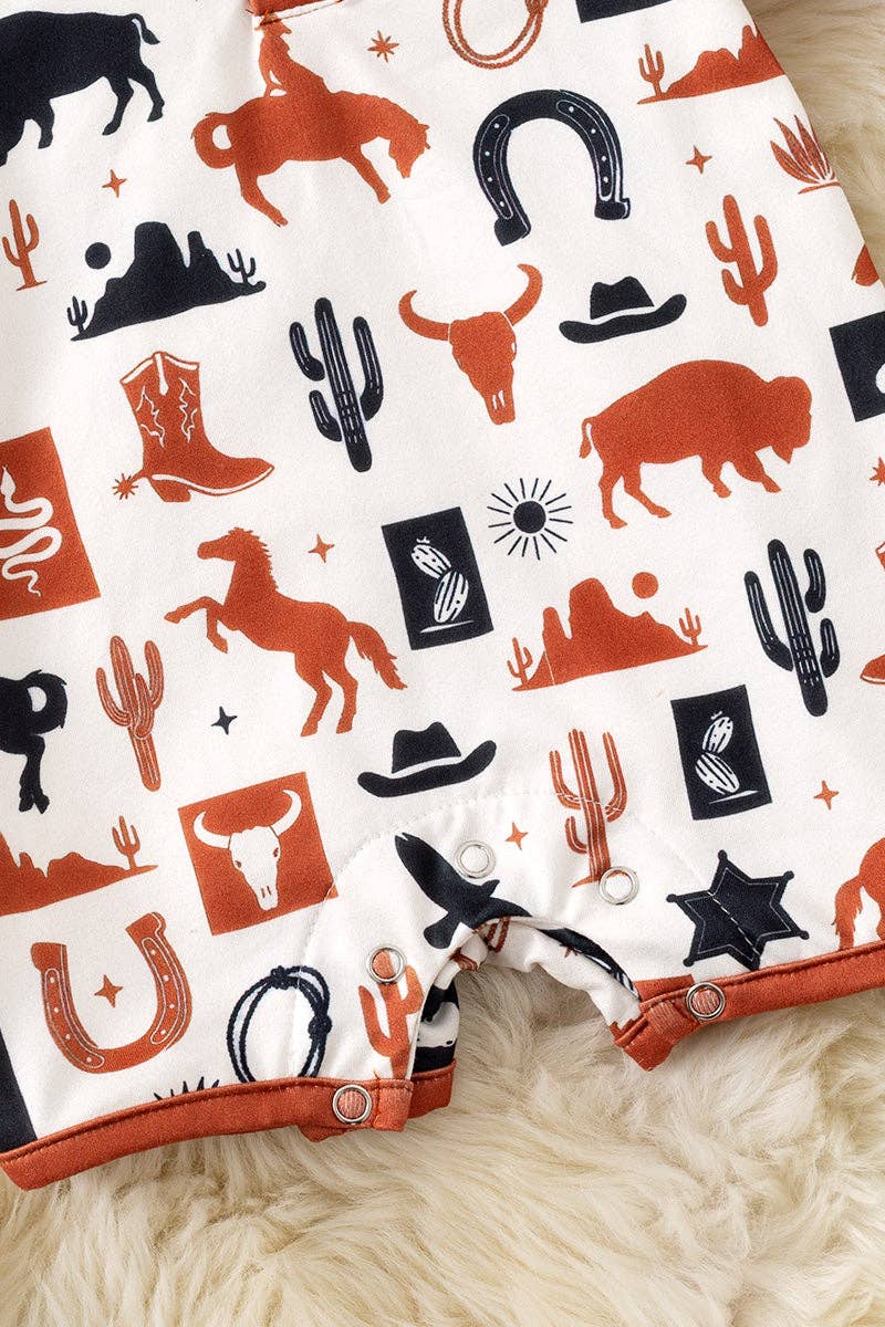 Ivory multi-printed western baby romper with snaps. RPB60290 AMY: 12-18 months