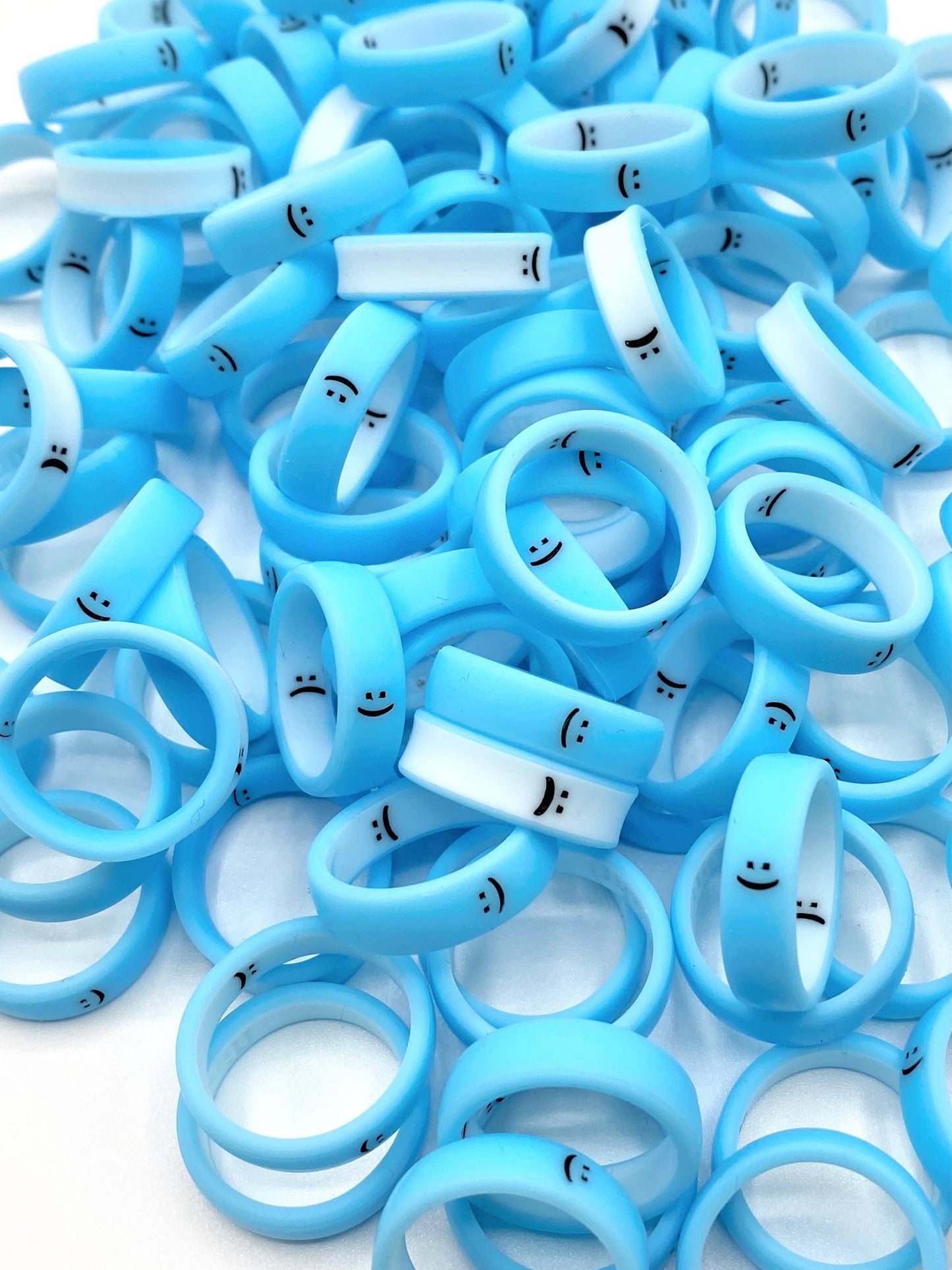 Flip Reversible Smile and Frown Ring Neon Blue