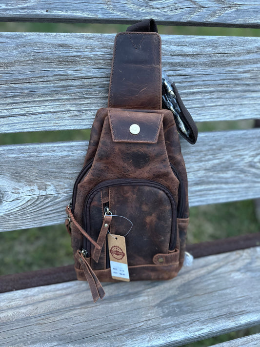 Antiqued leather sling bag