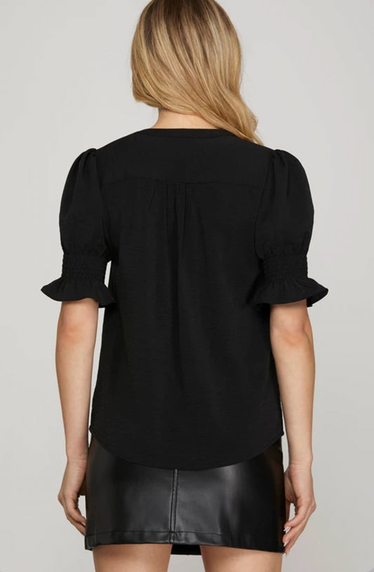Black blouse with rutched shirt sleeve